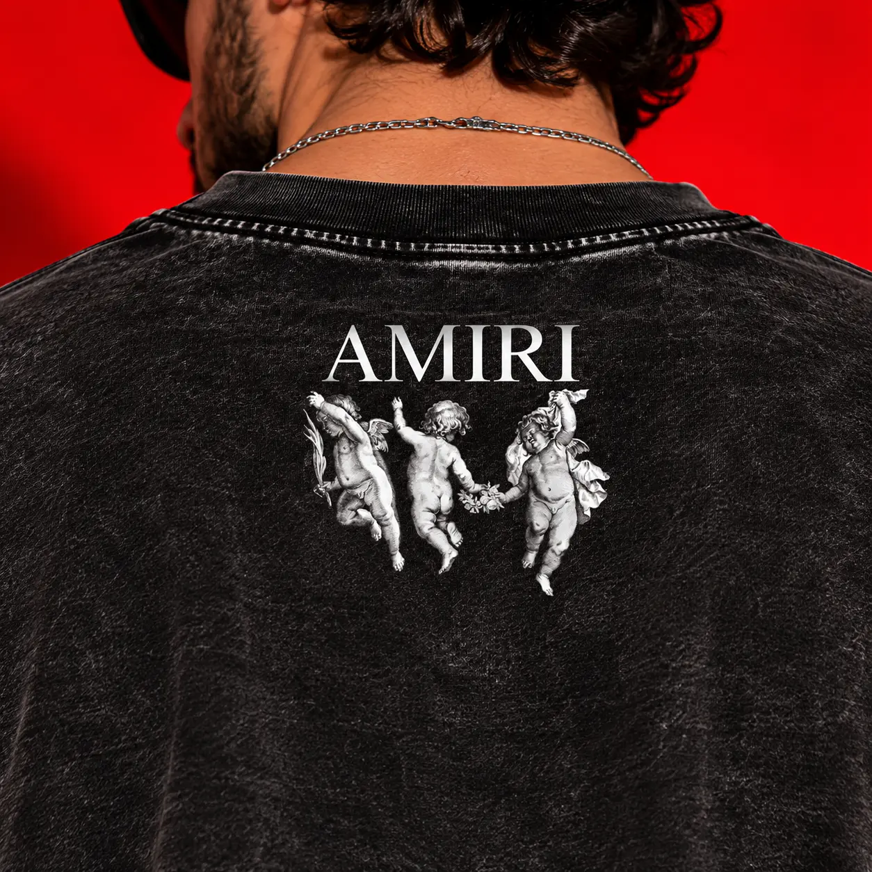 AMIRI Cherub Oversized Acid-Wash Black T-Shirt | Gothic Luxury Graphic Tee