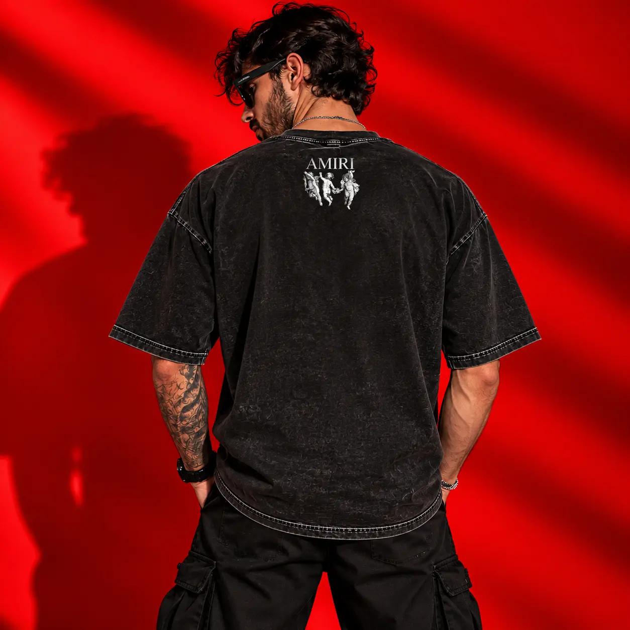 AMIRI Cherub Oversized Acid-Wash Black T-Shirt | Gothic Luxury Graphic Tee